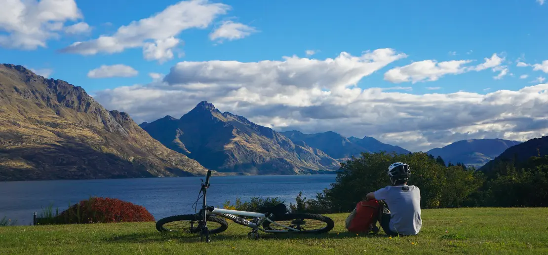 Biker resting in mountains